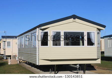 Exterior of modern static caravan in trailer park, England.