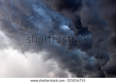 Similar – Image, Stock Photo thick grey clouds of smoke surrounded by glowing sparks