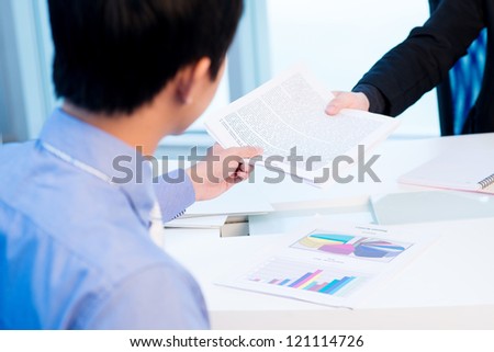 Similar – Image, Stock Photo Unrecognized person passing a marijuana joint to his friend during a party.