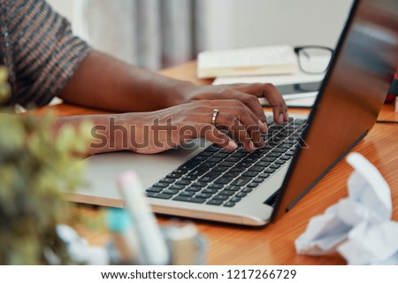 Similar – Image, Stock Photo Anonymous black businesswoman using smartphone at home