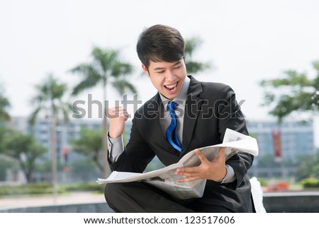 Businessman being excited with the latest news
