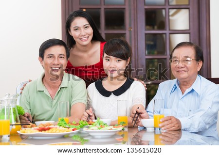 Portrait of an asian family at the dinner