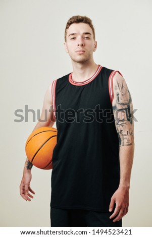 Similar – Image, Stock Photo Confident basketball player standing on playground