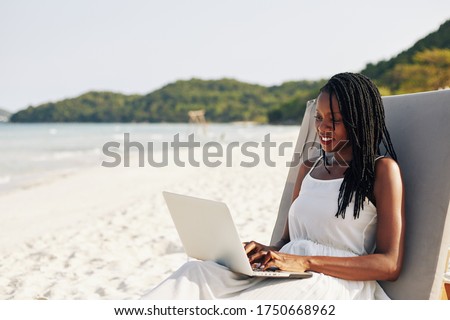 Similar – Image, Stock Photo Woman resting on sandy beach on cloudy day