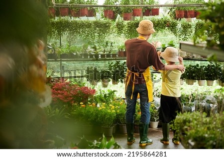 Similar – Image, Stock Photo Father explains nature to child