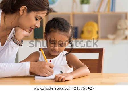 Similar – Image, Stock Photo Adult daughter teaching her elderly mother to use laptop