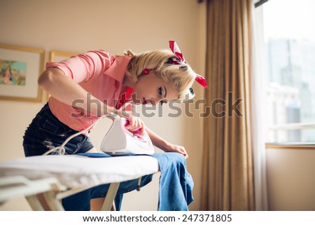 Retro housewife ironing clothes