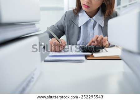 Accountant working with papers