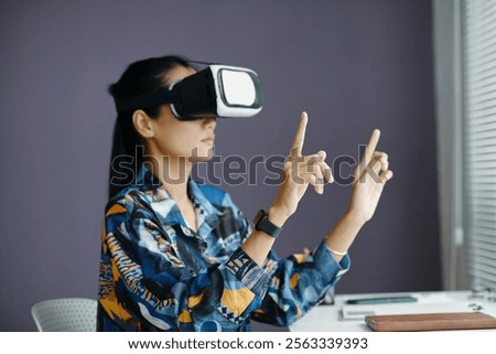 Similar – Image, Stock Photo Unrecognizable woman in VR goggles controlling drone