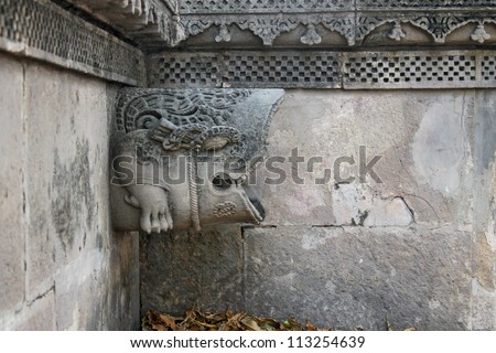 AHMEDABAD, GUJARAT / INDIA - APRIL 06 : Hutheesing Jain Temple on April 06, 2012 in Ahmedabad. Sculpture of an animal head on the temple exterior. Created in 1847 A.D. during British rule in India