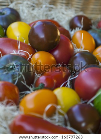 Eco-friendly products on the market stall.  Different varieties of tomatoes