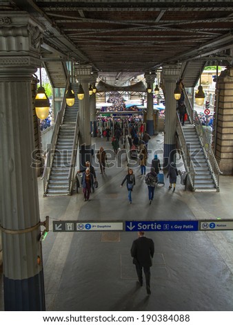 Paris, France, May 1, 2013. Passengers leave the ground station of the Paris metro