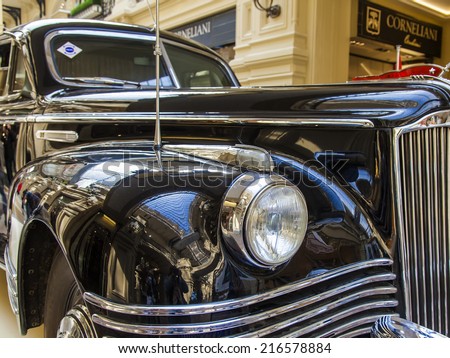 Moscow, Russia, on September 9, 2014. Exhibition of vintage Russian cars in GUM. Details of design of a body of the vintage car