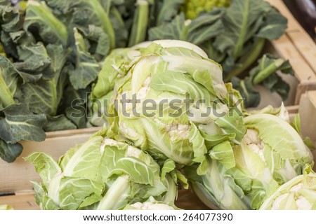 Cauliflower on a market counter