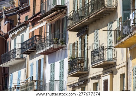 Vilfransh Sur Mer, France, on March 10, 2015. A fragment of facades of houses on the embankment. Vilfransh Sur Mer - the suburb of Nice, one of popular resorts of French riviera