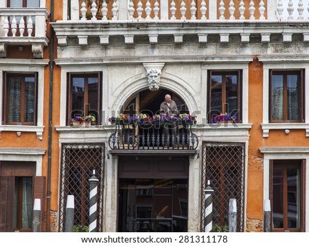 VENICE, ITALY - on APRIL 29, 2015. An architectural fragment of the ancient building (the XV century) on the canal embankment. A typical window in the Venetian style