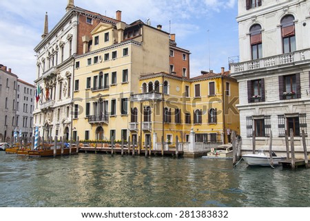 VENICE, ITALY - on APRIL 30, 2015. A view of an architectural complex of ancient buildings on the bank of the Grand channel (Canal Grande). The grand channel is the main  channel of Venice