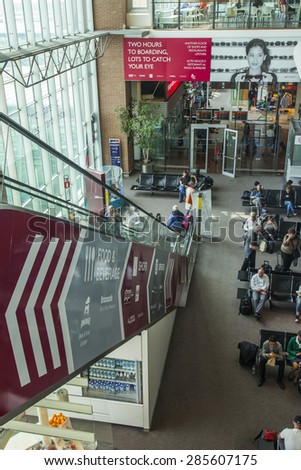VENICE, ITALY, on MAY 5, 2015. Marco Polo\'s airport, hall of departures. Passengers expect the announcement of the beginning a boarding into the plane