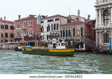 VENICE, ITALY - on MAY 4, 2015. City landscape. An architectural complex of buildings on the bank of the Grand channel (Canal Grande). Boats near the coast