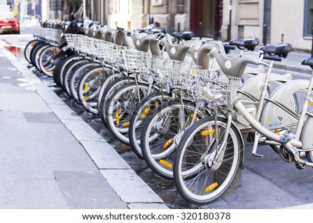 PARIS, FRANCE, on AUGUST 27, 2015. Bicycles on on the street, a parking of point of rent