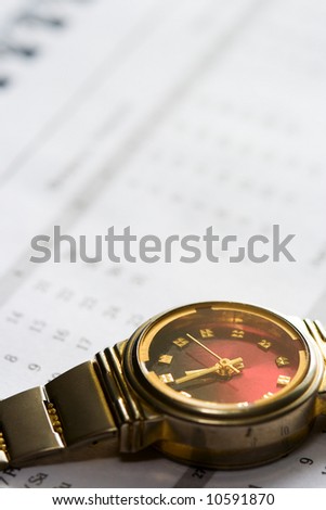 macro watch office concept with calendar background