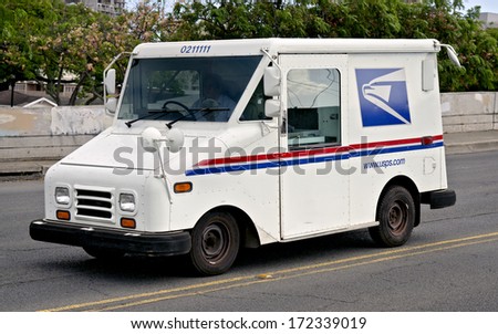 HONOLULU - AUGUST 30, 2012: US Postal Service truck on August 30, 2012 in Honolulu. USPS is the operator of the largest civilian vehicle fleet in the world.