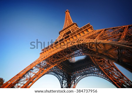 Similar – Image, Stock Photo Under the Eiffel Tower .  With light and shadow . Above me the Great Steel Frame . In the background a skyscraper and many trees.