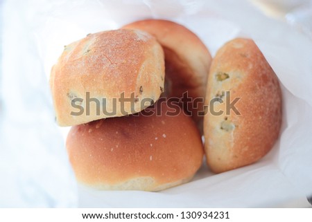 Bread in a white paper bag background