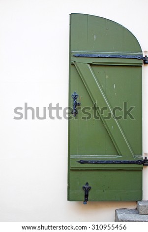 Old wooden green doors in the streets