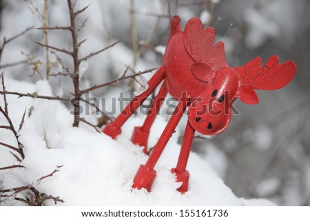 Christmas elk in a winter landscape