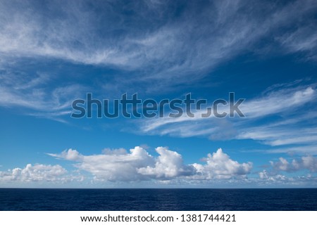 Similar – Image, Stock Photo Fair weather clouds in front of a blue sky and a small section of a red tiled roof with a parabolic antenna / satellite dish / football transmission