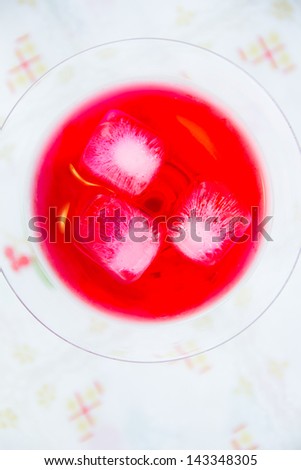 Red juice on top view on table
