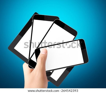 mobile phone and tablet  in the hand