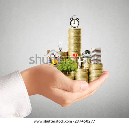 Begin for mortgage concept by money house from coins in hand