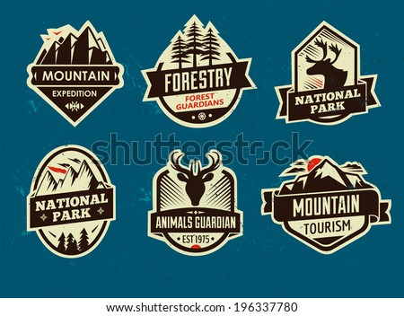Set of mountain adventure and travel emblems. Vector