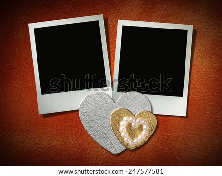 polaroid style photo frames on corkboard with paper heart