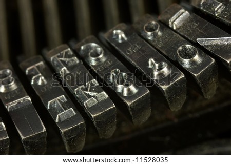 Old typewriter. Close up of metal letters.