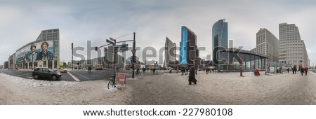 BERLIN, GERMANY - JANUARY 03, 2010: Potsdamer Platz and railway station in Berlin, Germany  It\'s a one of the main public square and traffic intersection in the centre of Berlin. 360 degree panorama