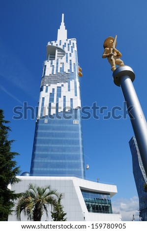 BATUMI, ADJARA, GEORGIA - SEPTEMBER 16: Batumi Technological University Tower on September 16, 2013 in Batumi. It is the first ever skyscraper in the world with an integrated Ferris wheel.