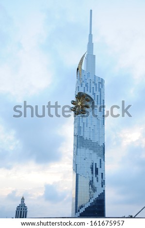 BATUMI, ADJARA, GEORGIA - SEPTEMBER 20: Batumi Technological University Tower on September 20, 2013 in Batumi. It is the first ever skyscraper in the world with an integrated Ferris wheel.
