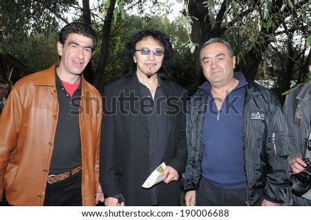 SPITAK, ARMENIA - OCTOBER 1: Tony Iommi of Black Sabbath and his fans on October 1, 2009 in Spitak, Armenia. He visits Armenia within the framework of “Armenia Grateful 2 Rock” project.