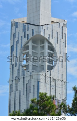 BATUMI, ADJARA, GEORGIA - SEPTEMBER 26: Batumi Technological University Tower on September 26, 2014 in Batumi. It is the first ever skyscraper in the world with an integrated Ferris wheel.