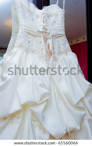 The wedding dress a veil,  fur coat, dress prepared for the bride