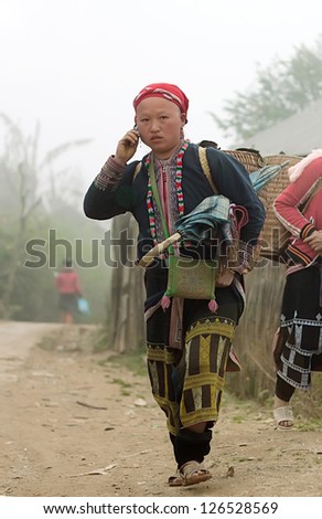 SAPA, VIETNAM - FEB 11: Unidentified women from the Red Dao Ethnic Minority People on February 11, 2012 in Sapa, Vietnam. Red Dao Minority are the 9th largest ethnic group in Vietnam