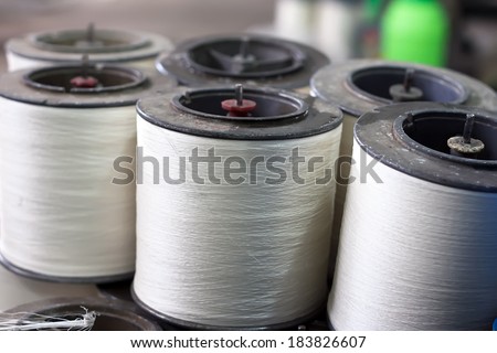 Textile industry - yarn spools in a textile factory