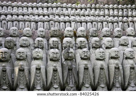 jizo statues at a japanese shrine protecting miscarriage or unborn children in the after life