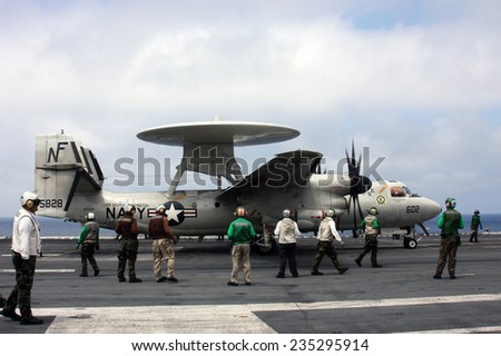 Sea of Japan, Japan, August, 25, 2011,  United States Navy E-2 Hawkeye on an Aircraft Carrier preparing for a catapault launch.