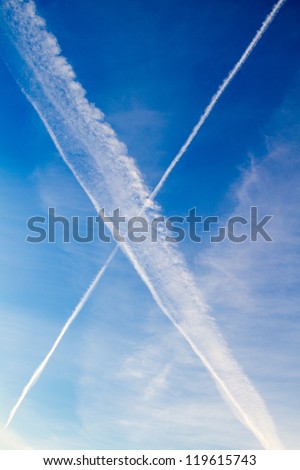 Airplane exhaust fumes forming a Scotland flag in the sky