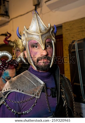 SITGES, SPAIN - FEBRUARY 15, 2015: Sitges Carnival\'s Carnestoltes, A man in a costume during the \'Disbauxa\' Parade celebrated on February 15, 2015 in Sitges, Spain.