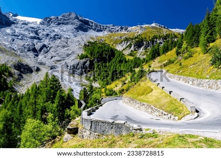 Similar – Image, Stock Photo Old serpentine road in the high alps
